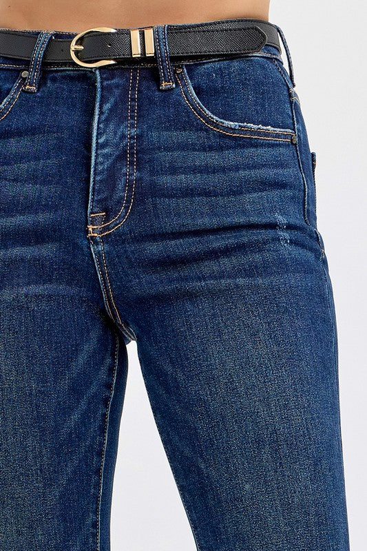 Close-up of high rise flare jeans with removable belt.