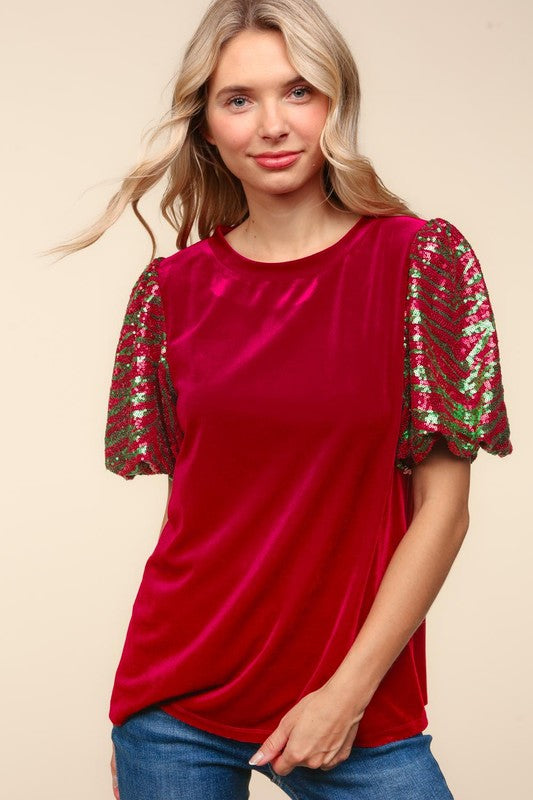 Velvet top with sequin sleeves in red, front view