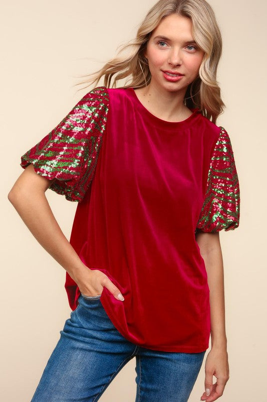 Red velvet top featuring sequin bubble sleeves