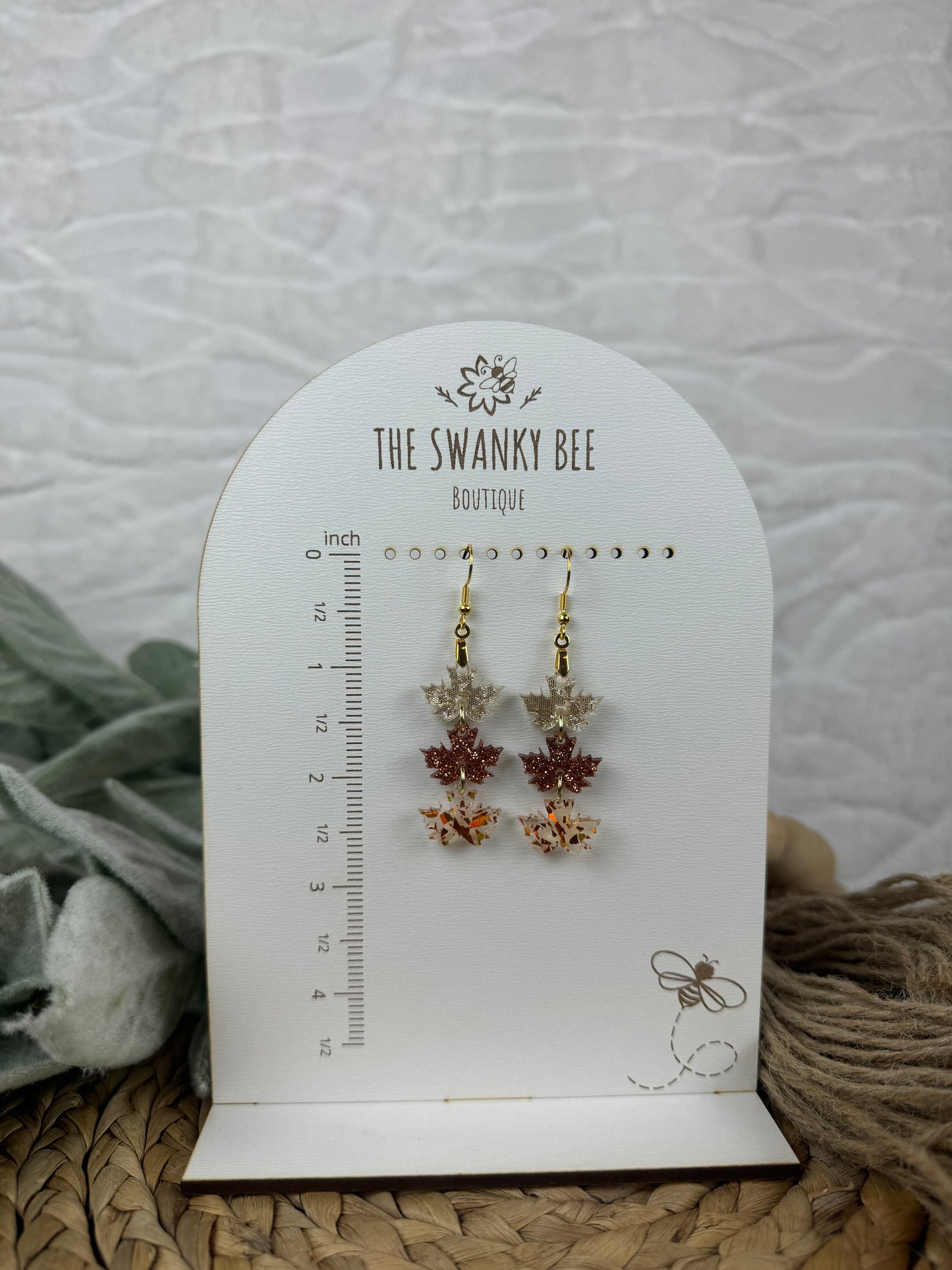 Delicate leaf earrings with gold hooks