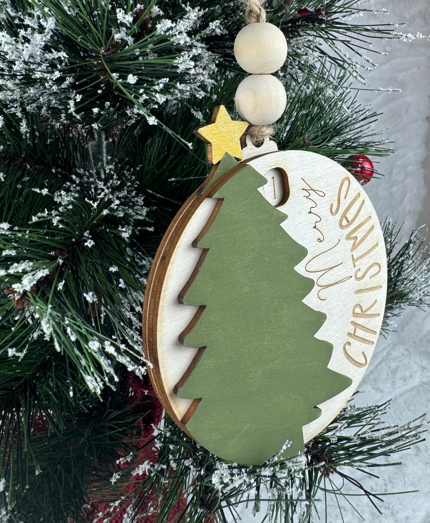 Angled view of Christmas Tree Countdown Ornament on tree