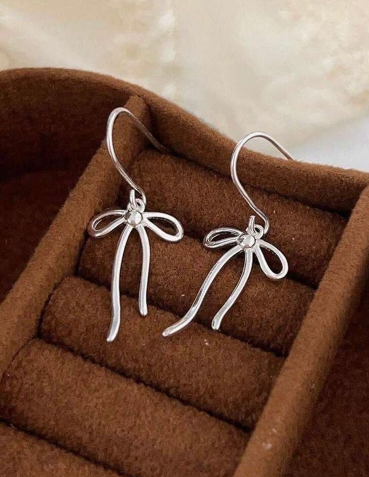 Silver Bow Drop Earrings