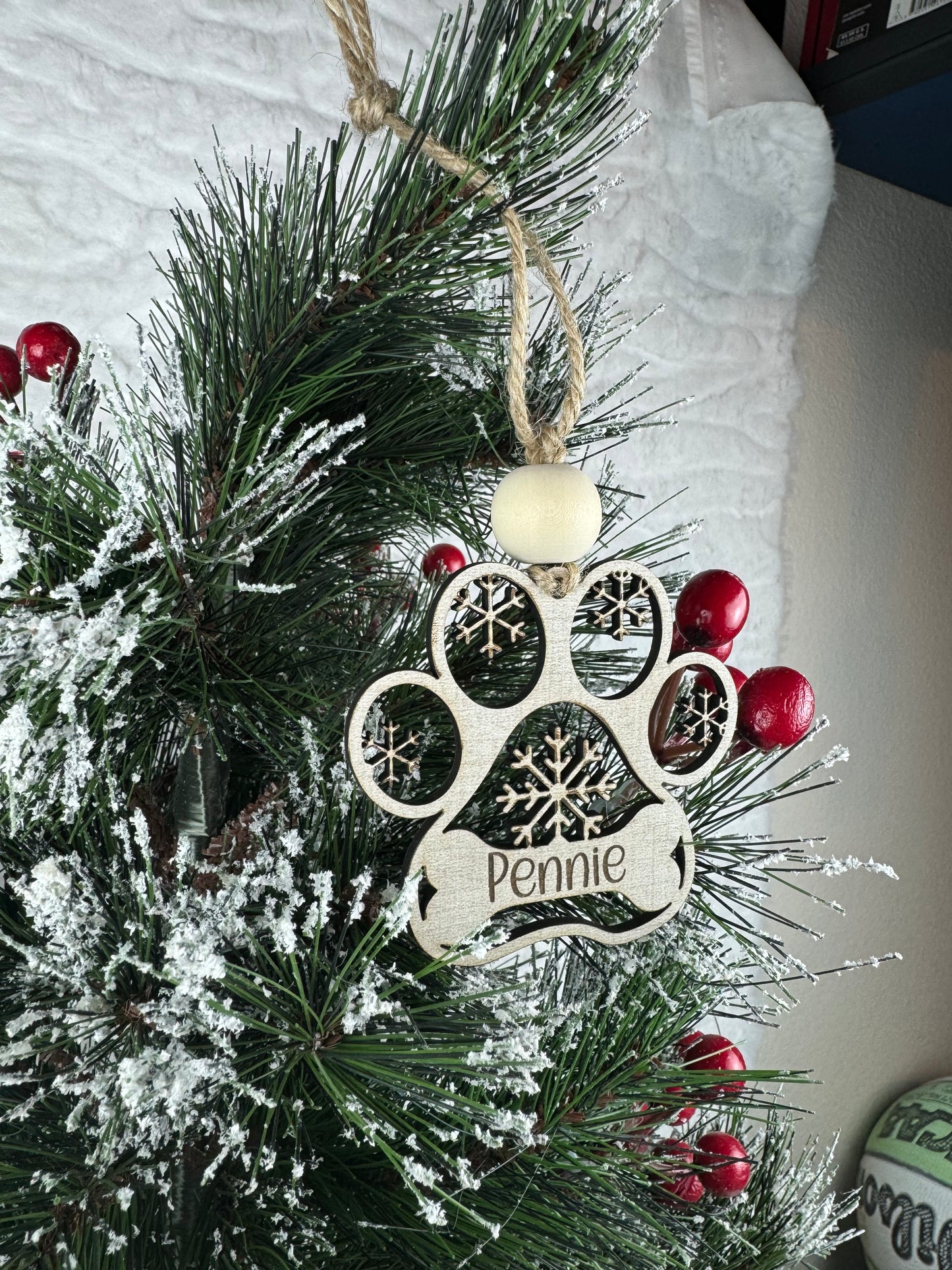 Custom dog ornament hanging on festive tree