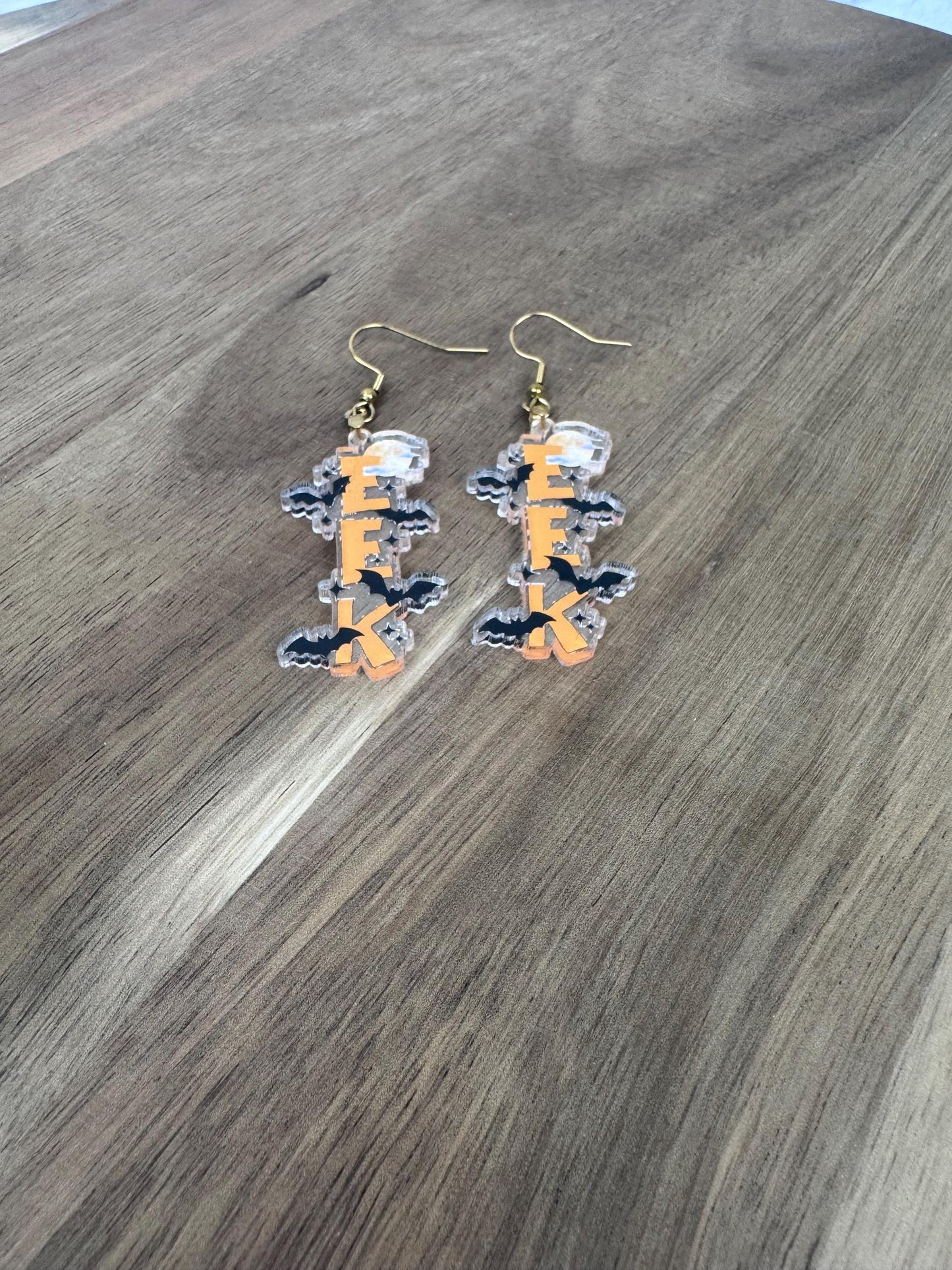 EEK Halloween Earrings, Clear Acrylic Bat Dangles, Spooky Season Jewelry