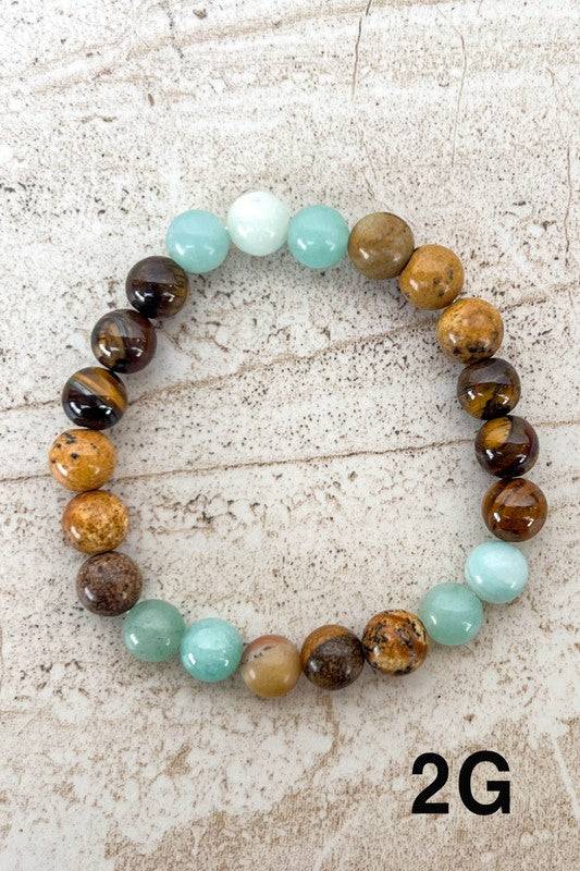Multicolor Stone Bead Bracelets featuring green, brown, and amber beads, ideal for adding earthy tones to your jewelry collection.
