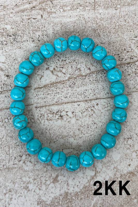 Bright turquoise Stone Bead Bracelets with black veining, a bold accessory for a vibrant and stylish jewelry collection.