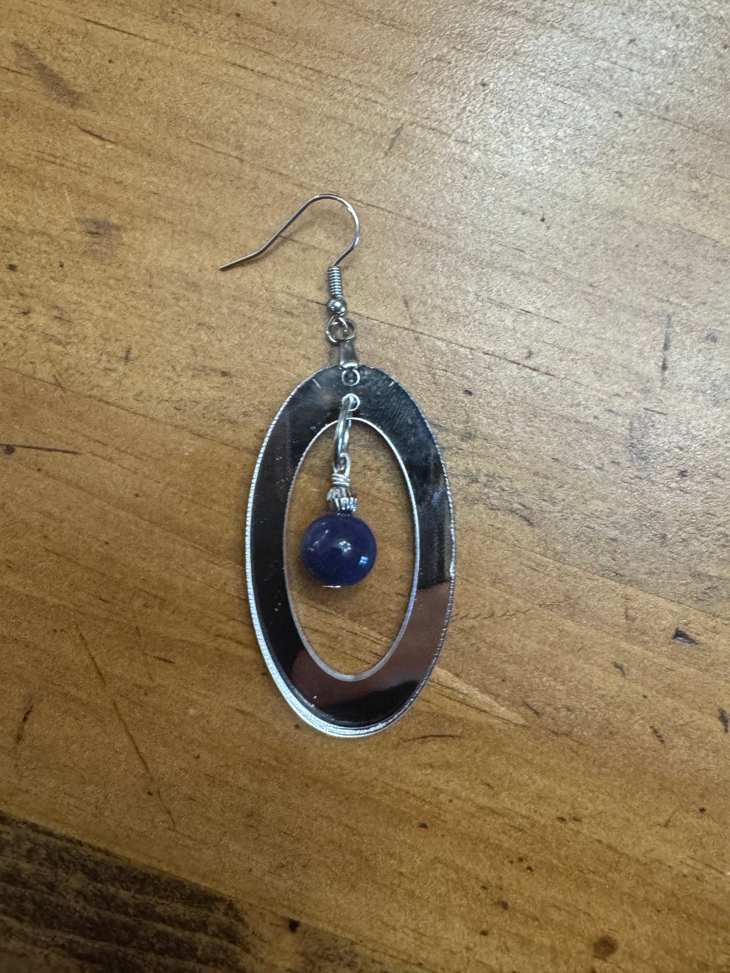 Silver Mirror Acrylic Oval Earrings with Blue Dangle Bead