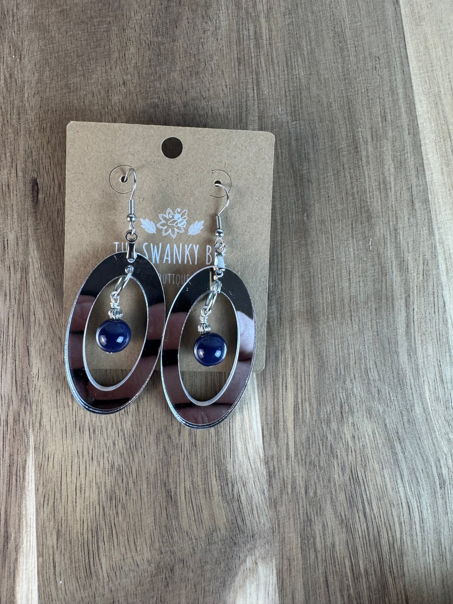 Silver Mirror Acrylic Oval Earrings with Blue Dangle Bead